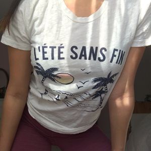 white t-shirt with french saying
